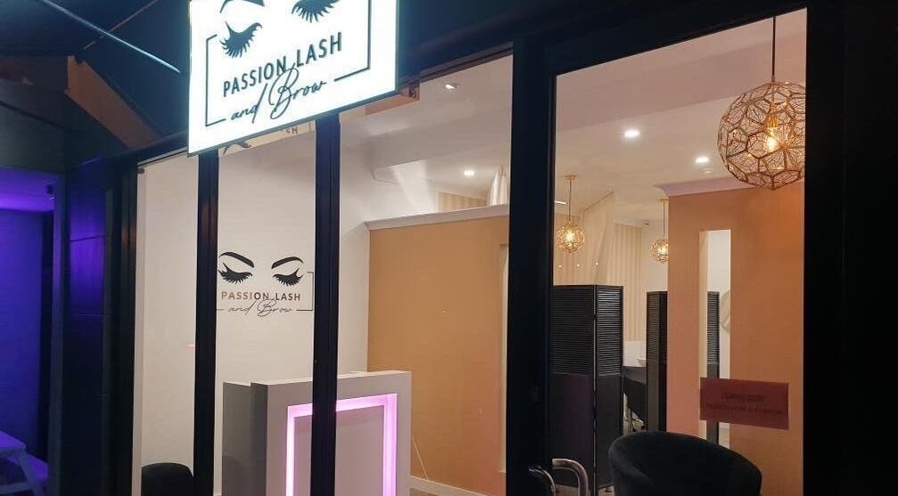 Illuminated entrance of Passion Lash and Brow in Mount Hawthorn, WA, AU, showcasing elegance and style.