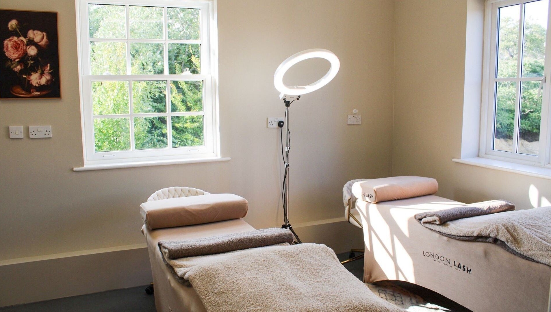 Cozy treatment room at True Lashes, House Of Beauty Framlingham, Framlingham, England, GB with two massage tables.
