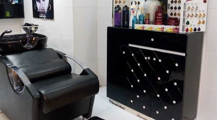 Luxury hair washing station at Damas Beauty Group - Al Mirgab, Sharjah, AE, showcasing elegance in boutique design.