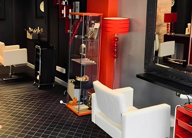 Stylish interior of Fuzion Hair & Beauty Zone in Stonehouse, England, GB featuring modern decor and seating.