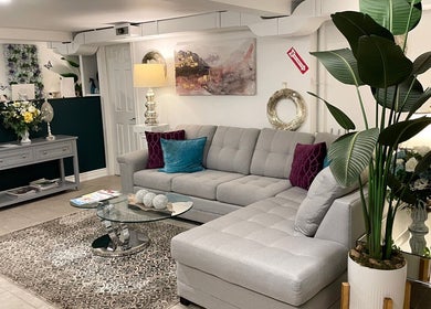 Elegant lounge at Fleuri Beauty and Spa in Markham, Ontario, CA, featuring plush seating and chic decor.