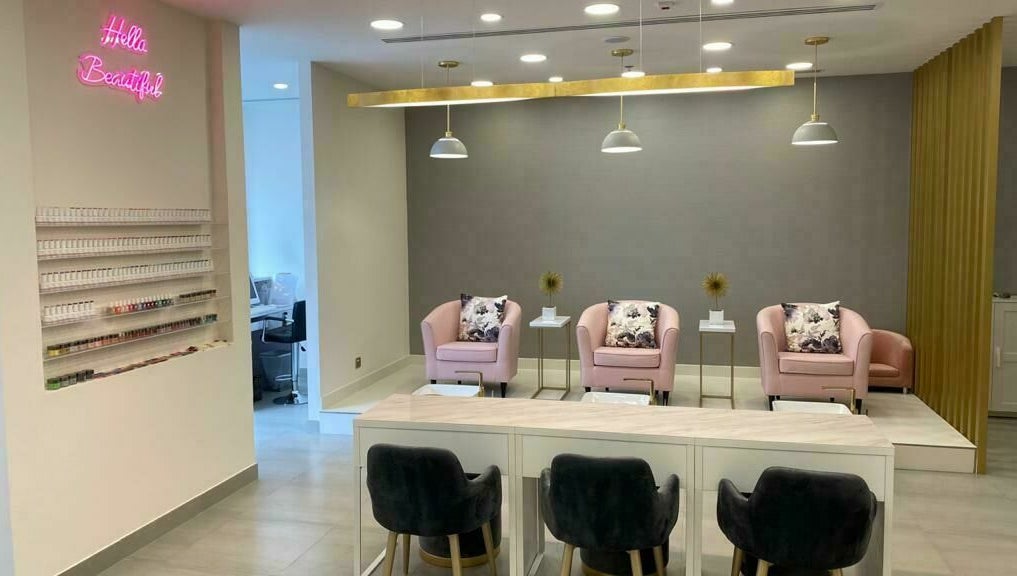 Stylish interior of Lush Nails, Dubai, Dubai, AE with elegant seating and nail polish display.