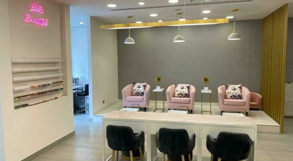 Stylish interior of Lush Nails, Dubai, Dubai, AE with elegant seating and nail polish display.