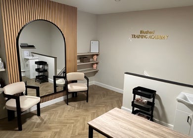 Modern interior of BLUSH Market Weighton, Market Weighton, England, GB, highlighting minimalist decor and inviting seating.