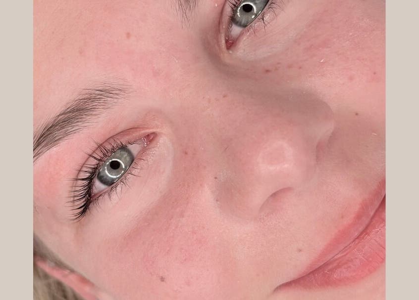 Close-up of a woman's radiant face with clear complexion and bright eyes at Blush, Sancton, England, GB.