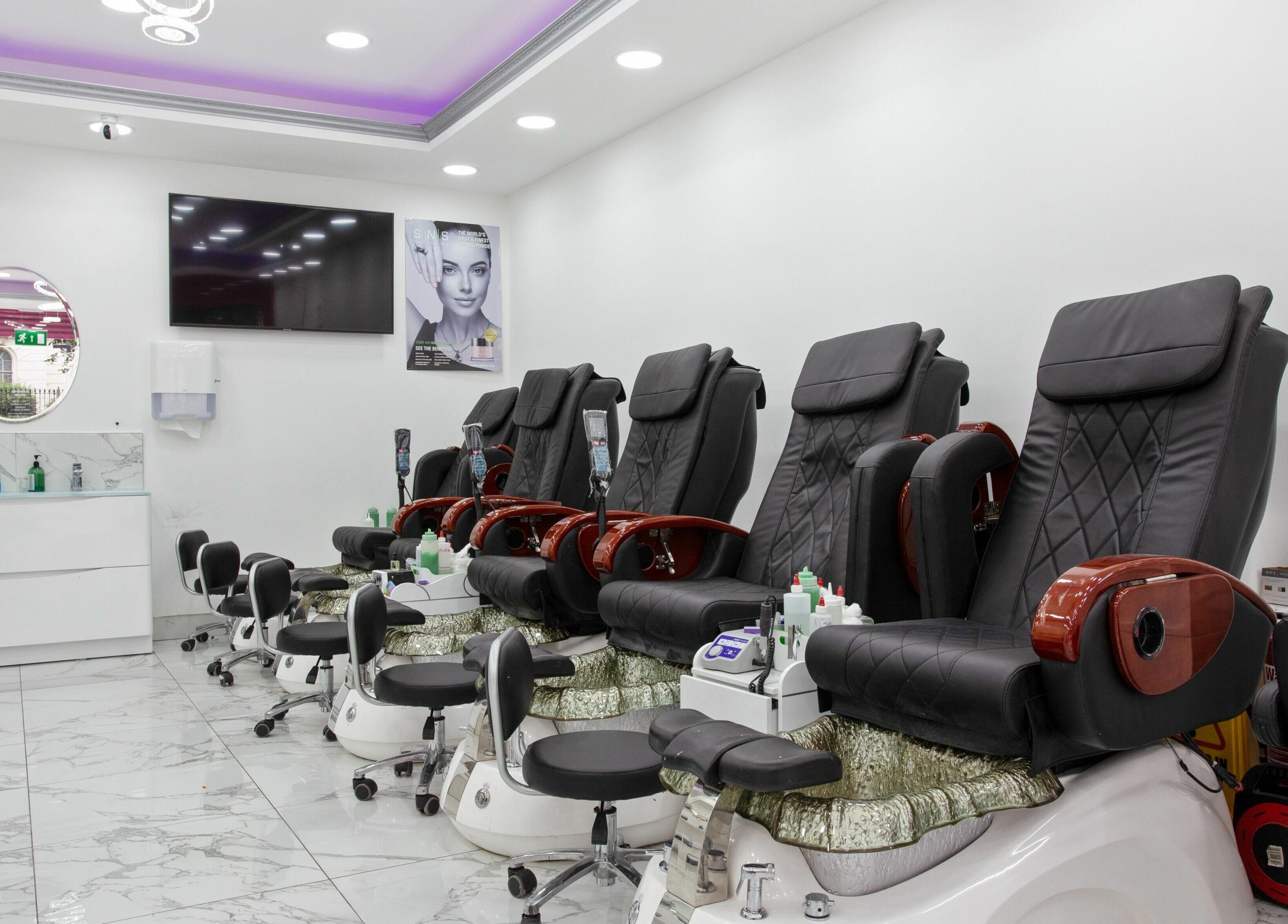Elegant pedicure stations at Haus of Colours, London, England, GB offering a luxury beauty experience.