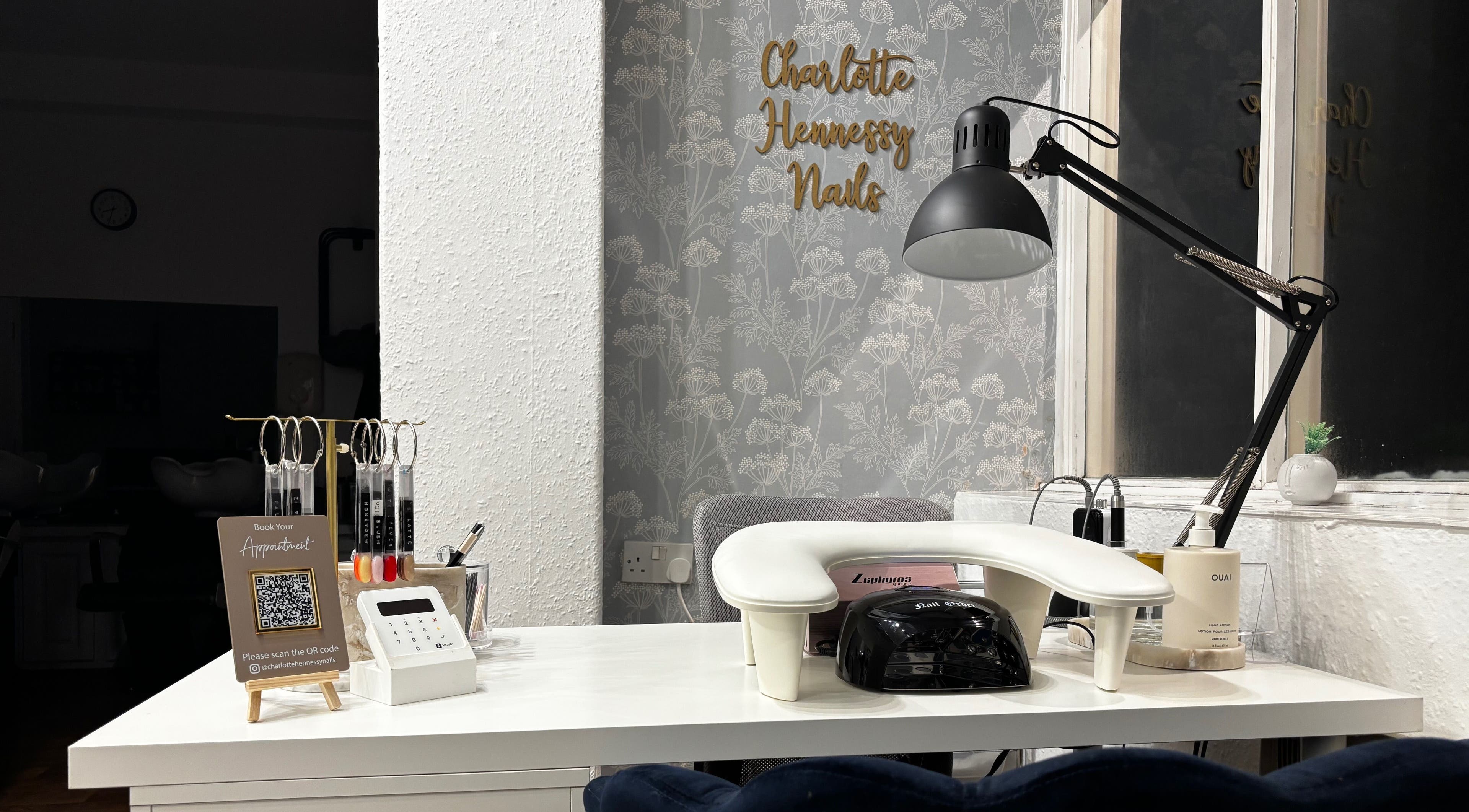 Charlotte Hennessy Nail Artist modern workspace in Turners Hill, England, featuring stylish decor and nail tools.