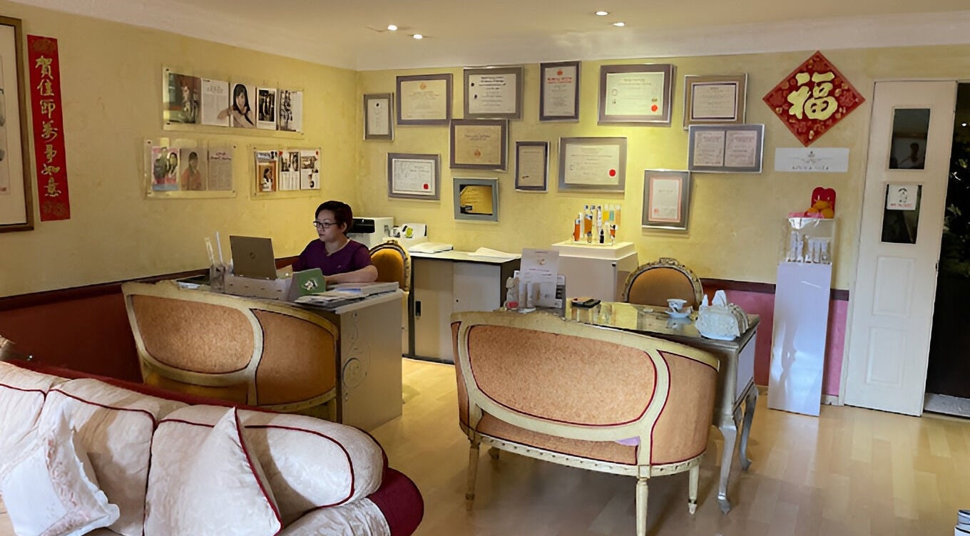 Reception area at Emma Lizs Subang Jaya, featuring elegant decor and framed certificates. Subang Jaya, Selangor, MY.