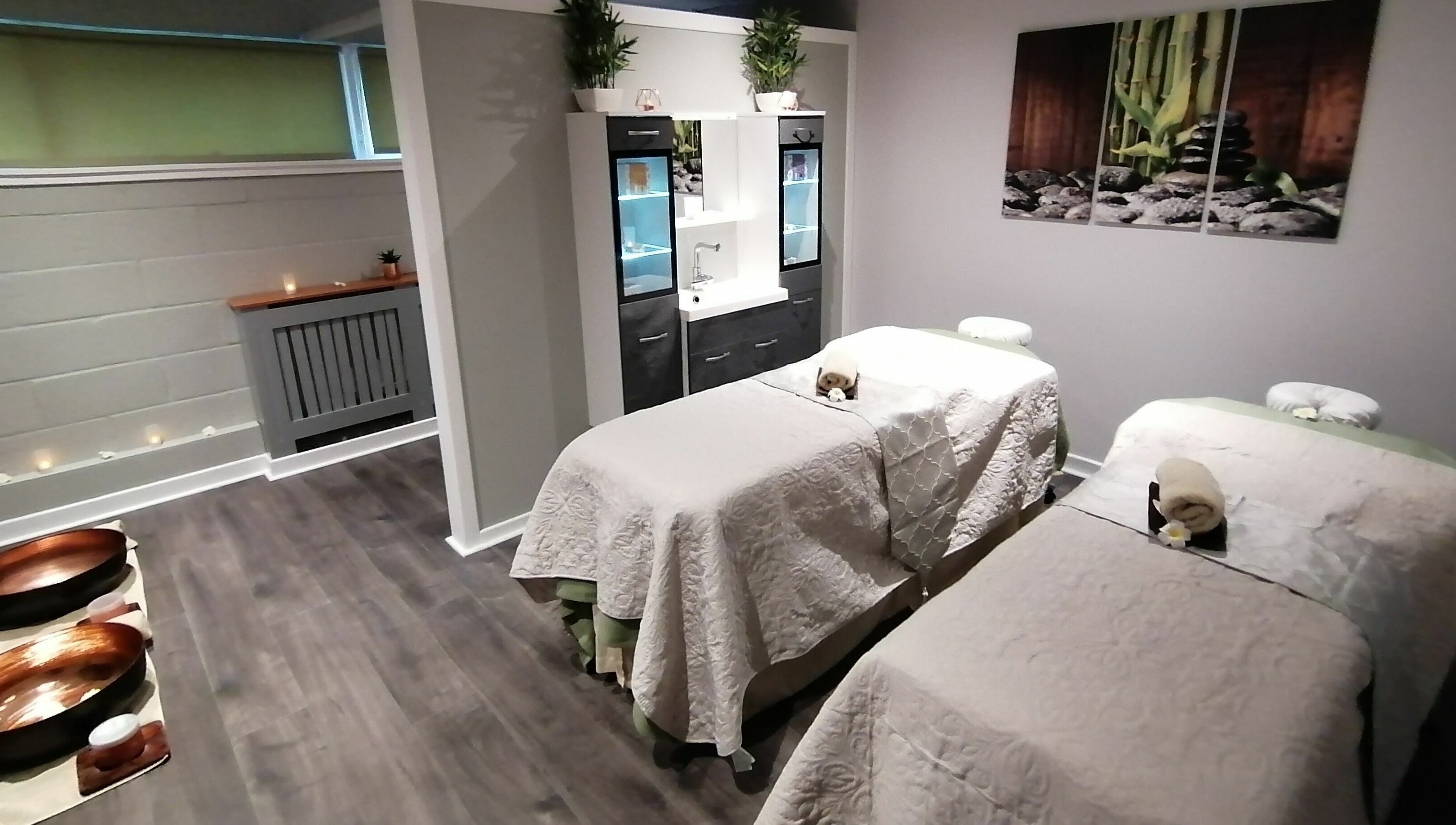 Serene treatment room at Skin Unique ltd, Dalgety Bay, Scotland, GB with massage tables and calming decor.