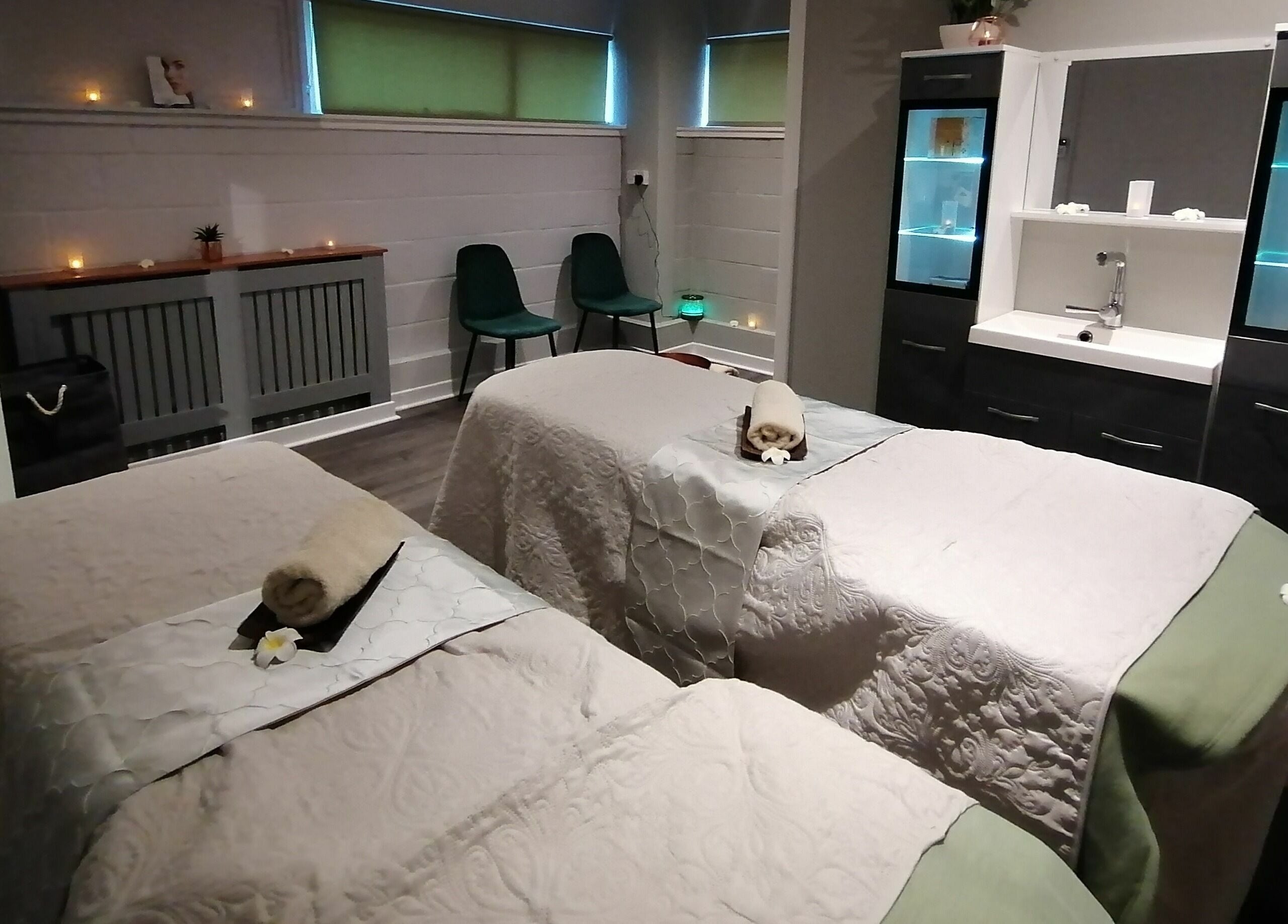 Relaxing treatment room at Skin Unique ltd, Dalgety Bay, Scotland, GB, featuring cozy massage tables.