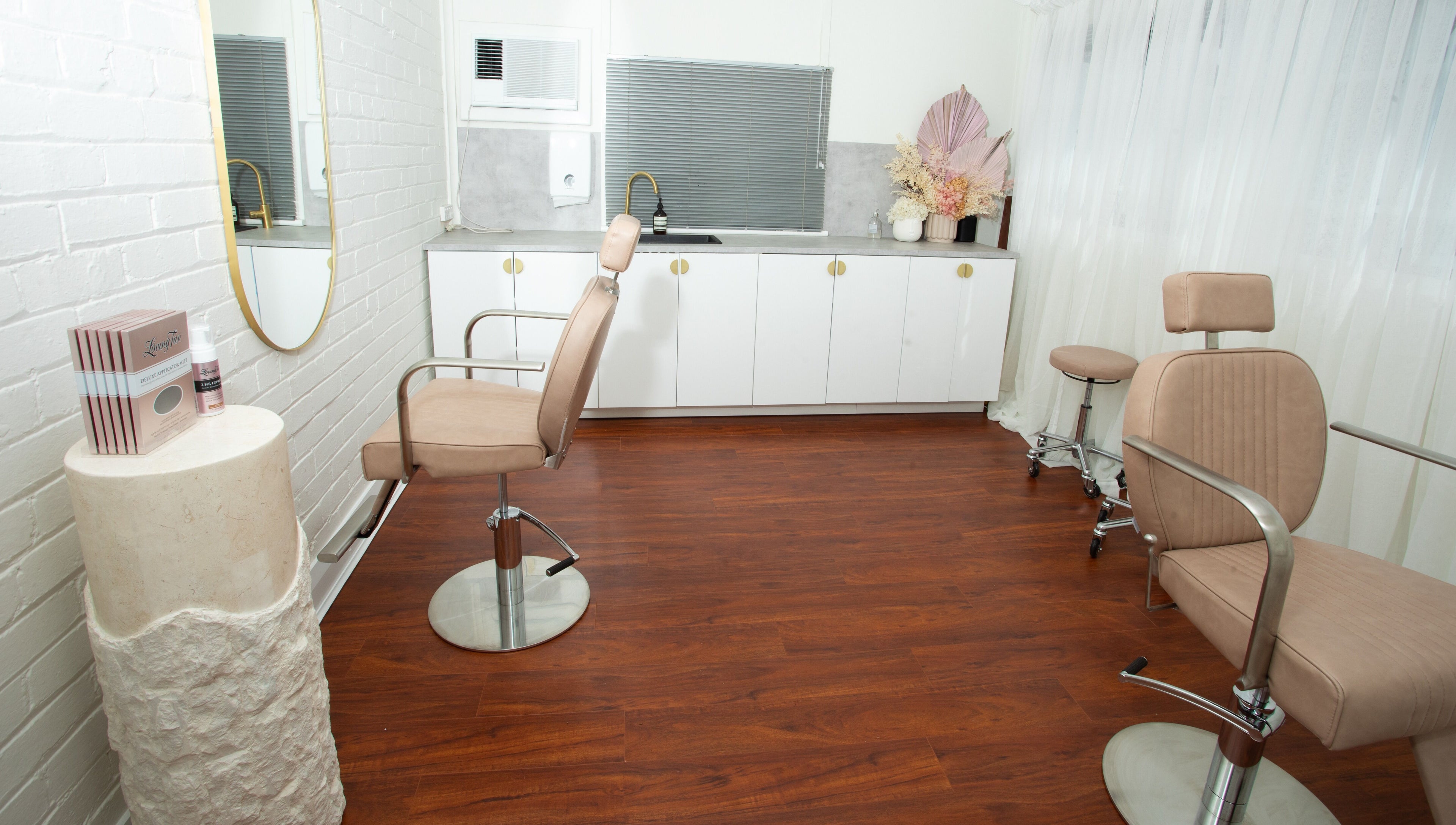 Chic interior of Rachel Lavelle Brows + Beauty in South Perth, Western Australia, AU featuring stylish chairs and decor.