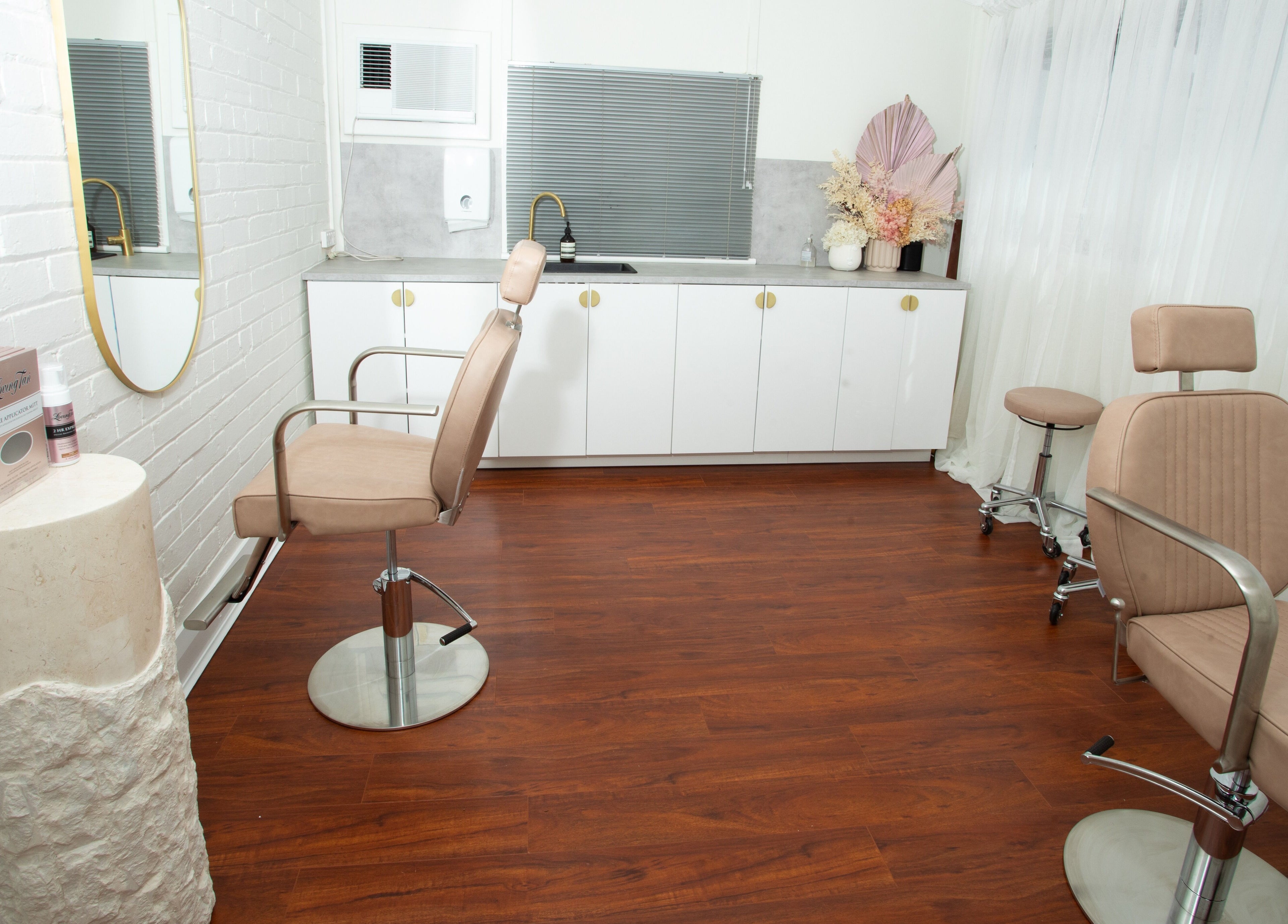 Chic interior of Rachel Lavelle Brows + Beauty in South Perth, Western Australia, AU featuring stylish chairs and decor.