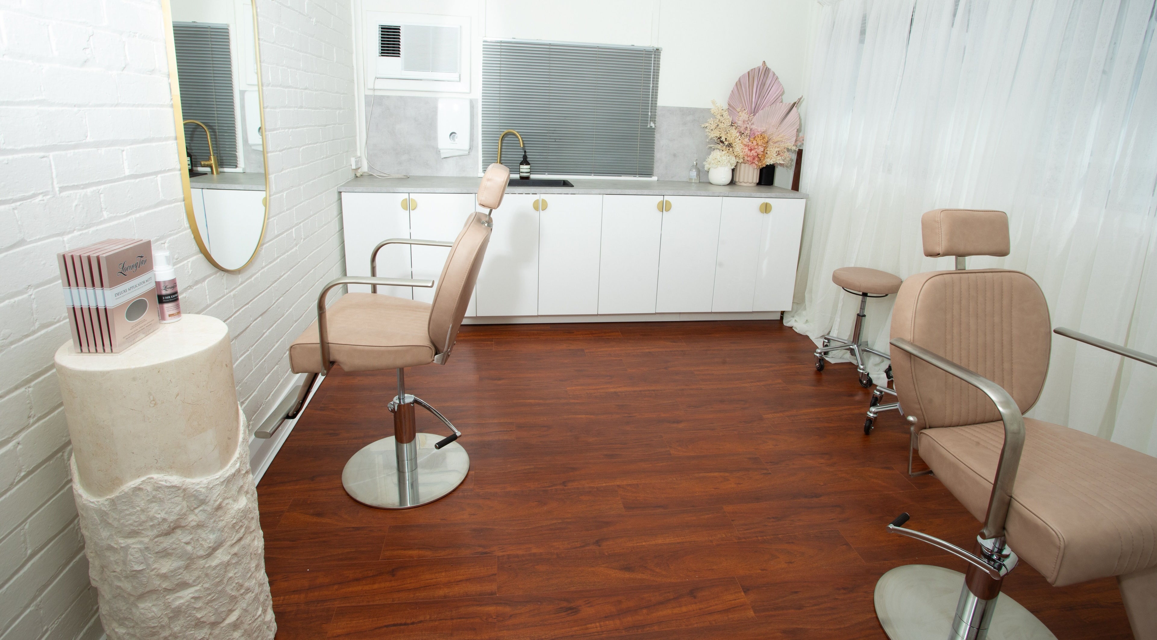 Chic interior of Rachel Lavelle Brows + Beauty in South Perth, Western Australia, AU featuring stylish chairs and decor.