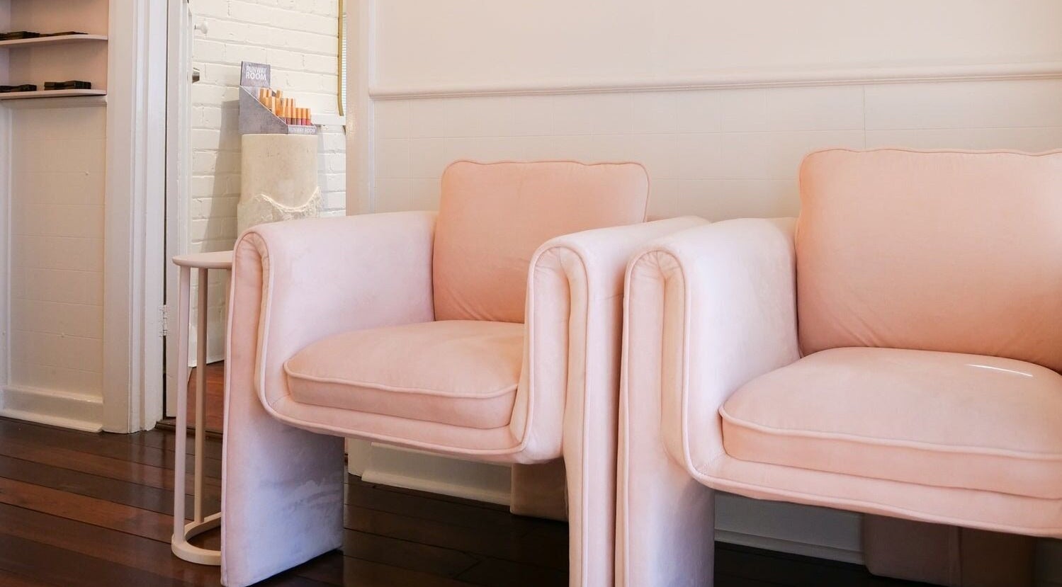 Elegantly styled blush chairs at Rachel Lavelle Brows + Beauty, South Perth, Western Australia, AU.