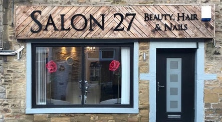 Salon27 entrance showcasing stylish design in Barrowford, England, GB, with vibrant rose decor.