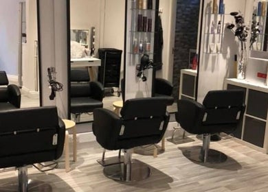Modern styling chairs at Salon27 in Barrowford, England, GB, showcasing sleek design elements.