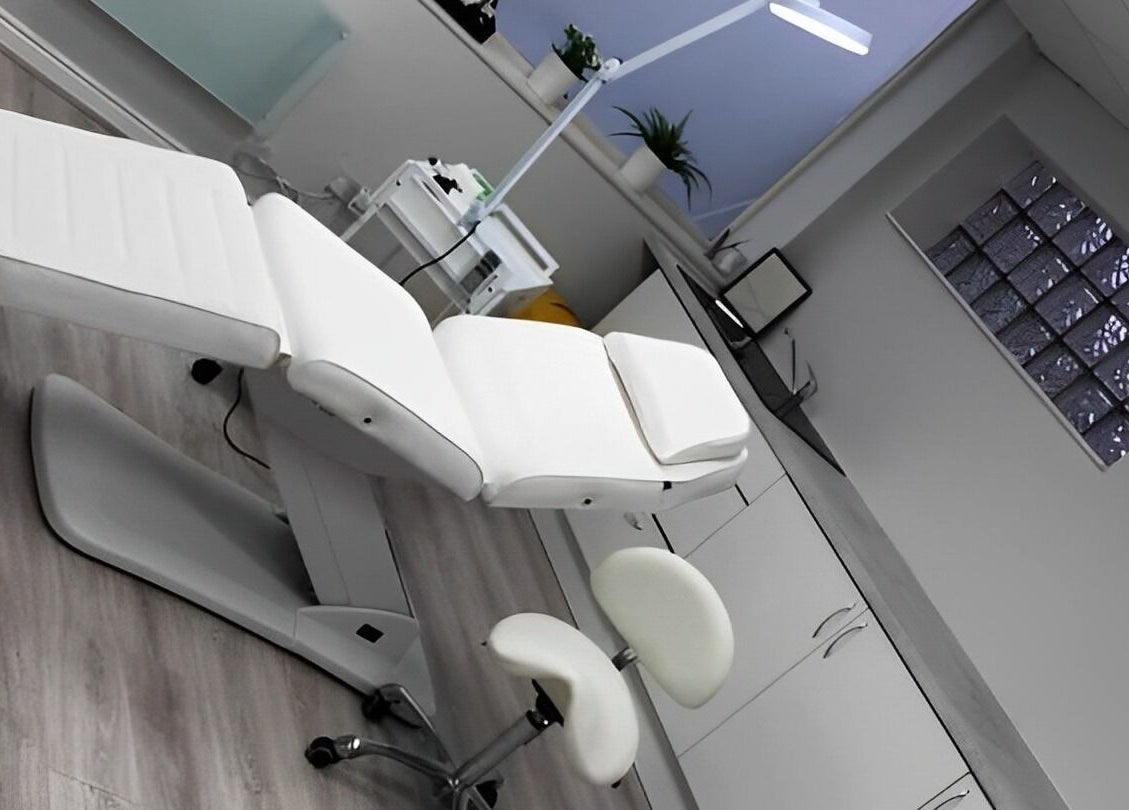 Modern treatment room with white chair at Reflect Aesthetics, Blackpool, England, GB.