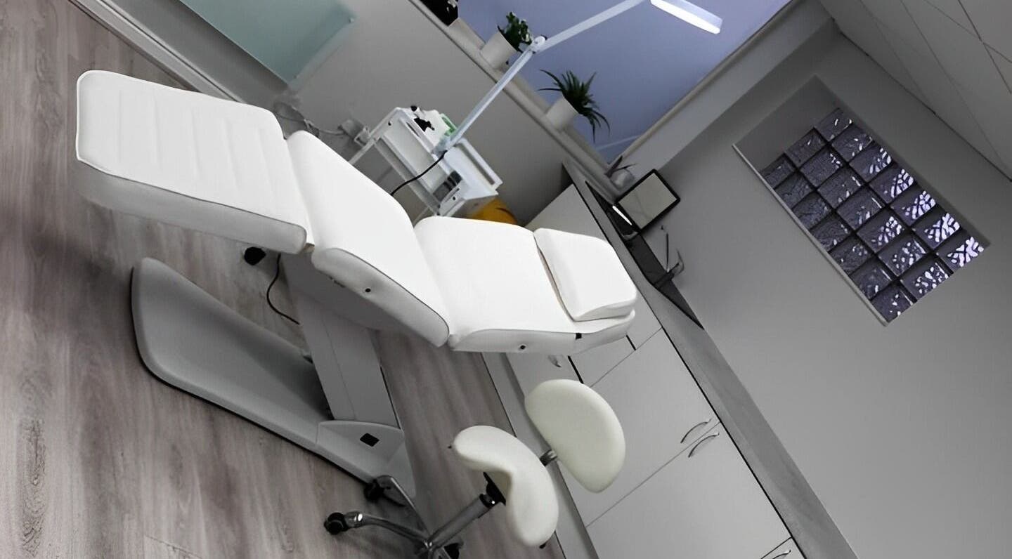 Modern treatment room with white chair at Reflect Aesthetics, Blackpool, England, GB.