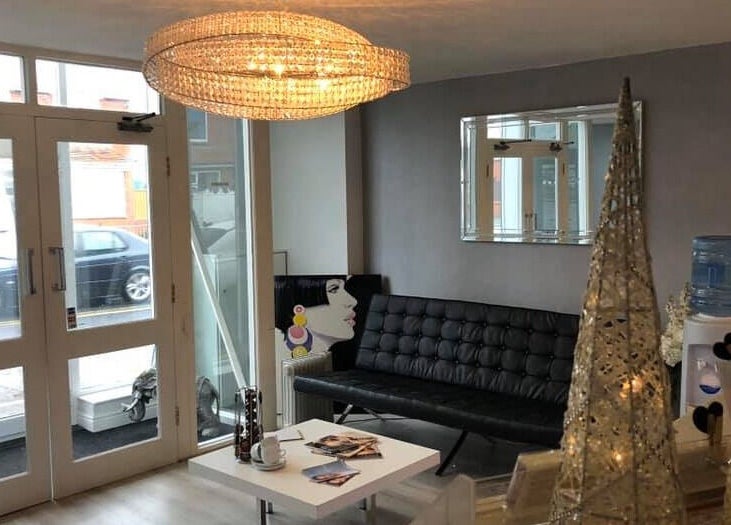 Elegant lounge area at Reflect Aesthetics, Blackpool, England, GB with modern seating and decor.