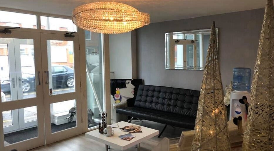 Elegant lounge area at Reflect Aesthetics, Blackpool, England, GB with modern seating and decor.
