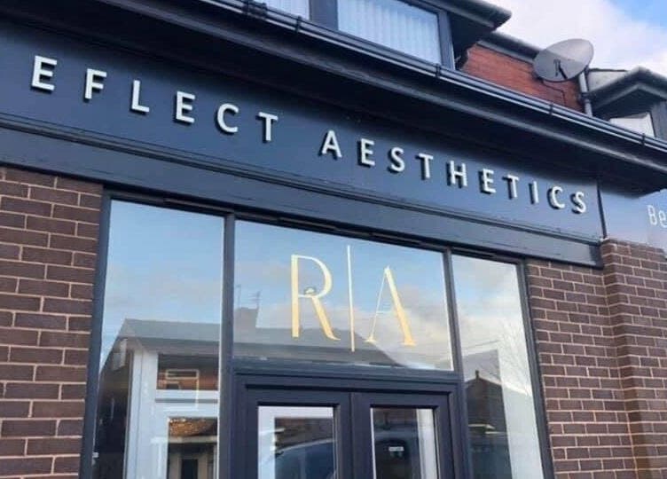 Exterior view of Reflect Aesthetics in Blackpool, England, showcasing its modern entrance and signage.