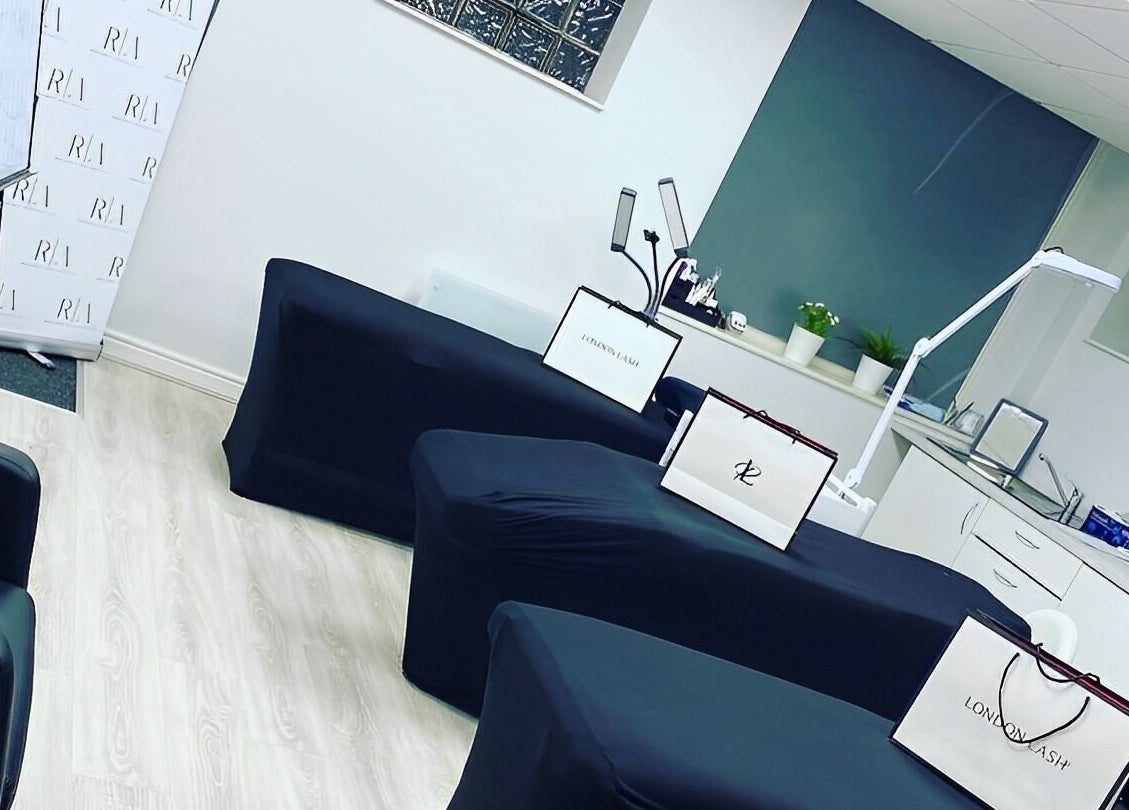 Elegant treatment room at Reflect Aesthetics, Blackpool, England, GB, with sleek modern decor.