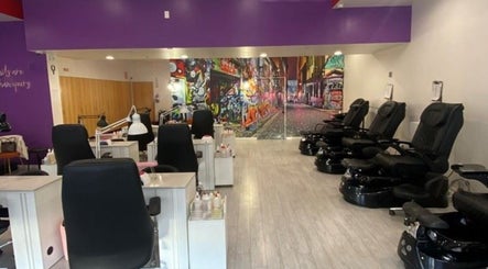 Stylish interior of Color Me Crazy Nail Salon in Los Angeles, California, US with vibrant decor.