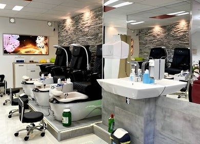 Innenraum von DUVI Nails Salon, Chur, Graubünden, CH mit luxuriösen Pedikürstühlen und stilvollem Waschbecken.