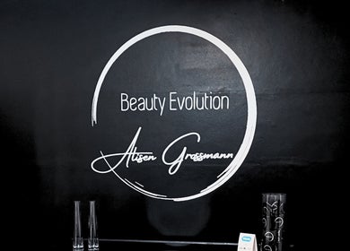 Beauty Evolution's elegant logo wall in Cape Town, Western Cape, ZA, showcasing stylish design.