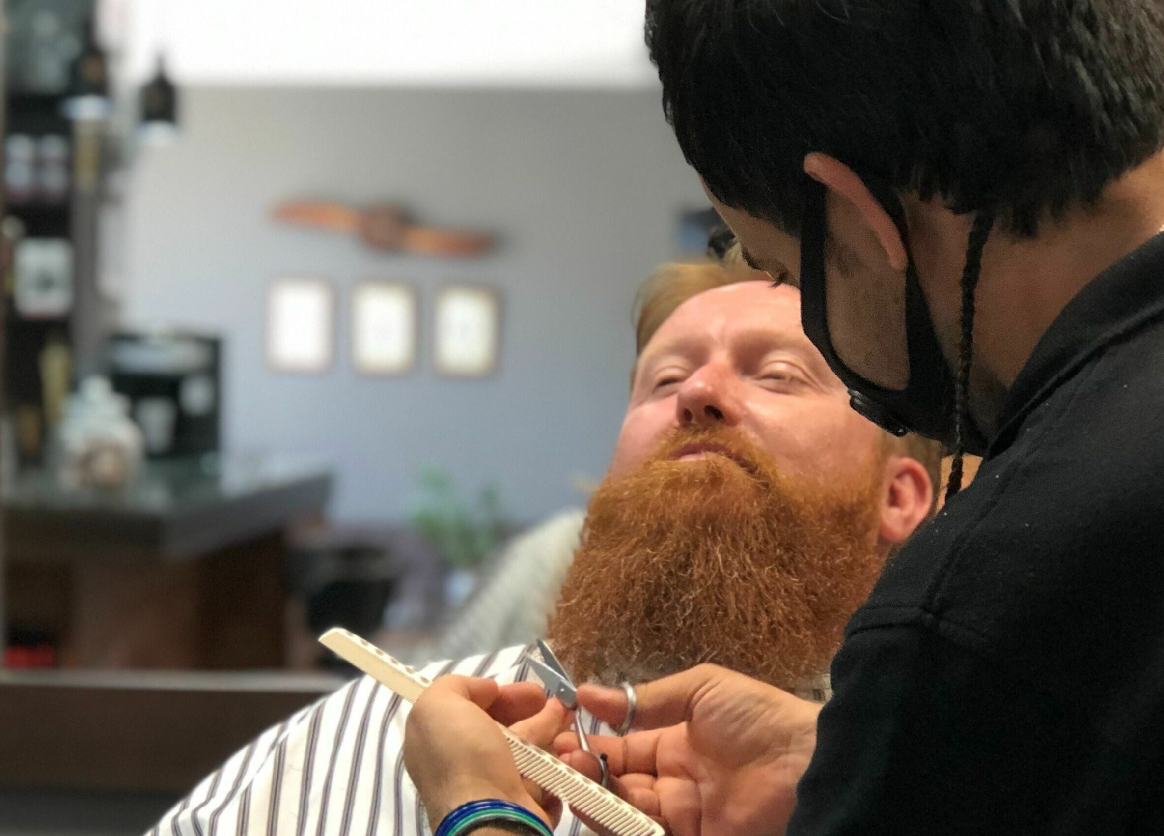 Beard grooming at Mancave Barbershop, Limassol, Limassol, CY with a relaxed client.