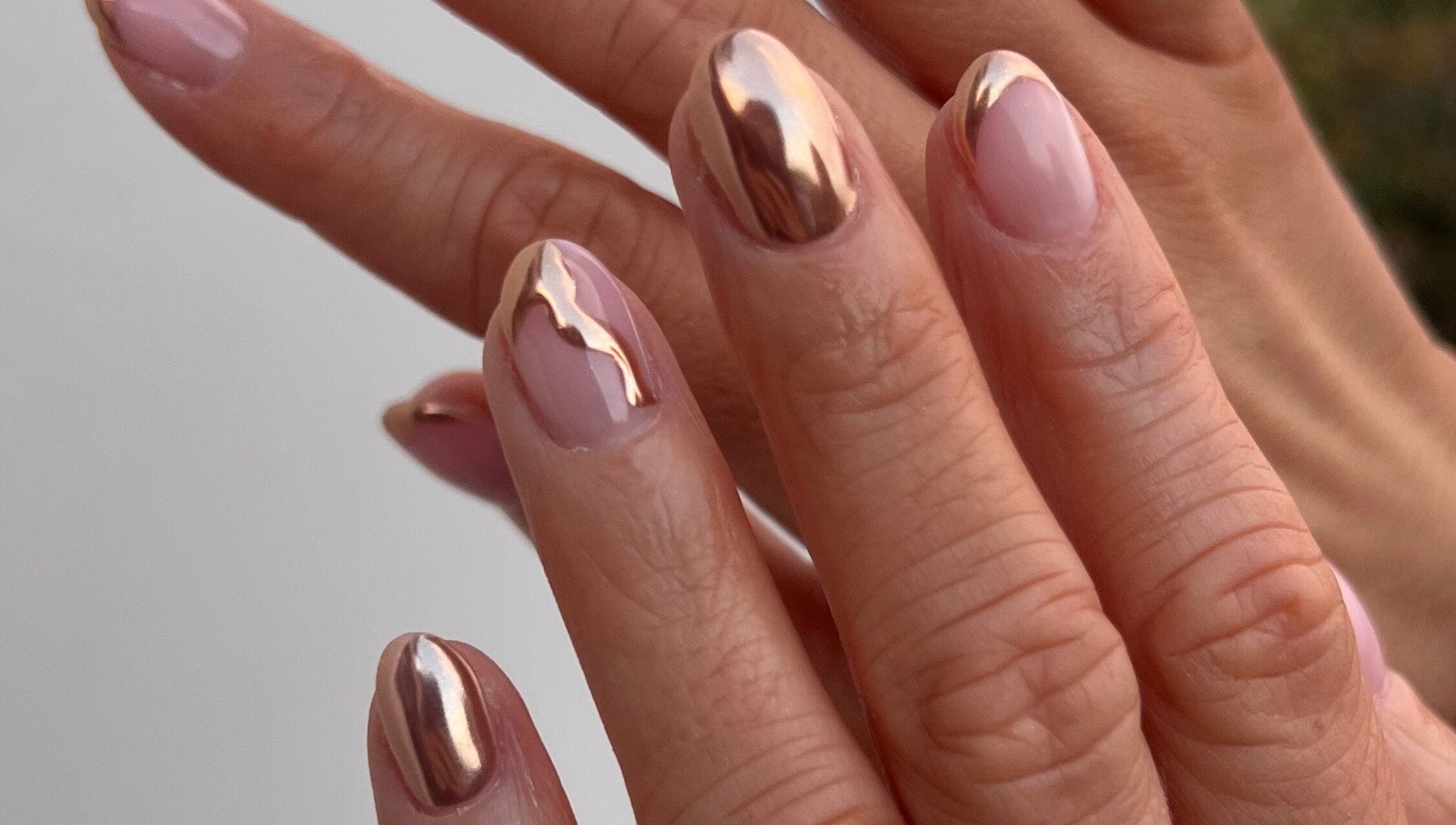 Elegant metallic nail art at Mint Beauty, Coleraine, Northern Ireland, GB. Shiny, stylish manicure.
