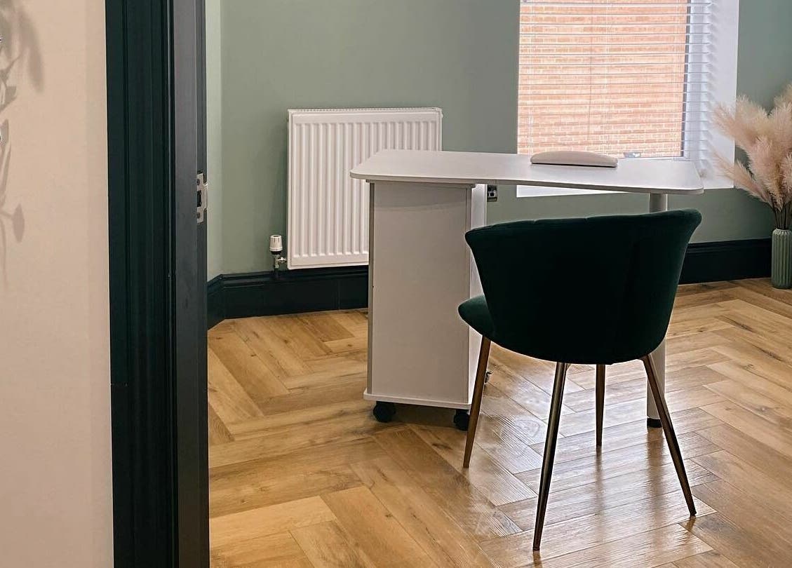 Serene office space at Leanne Alexandra in Bolton, England, GB with modern desk and chair.