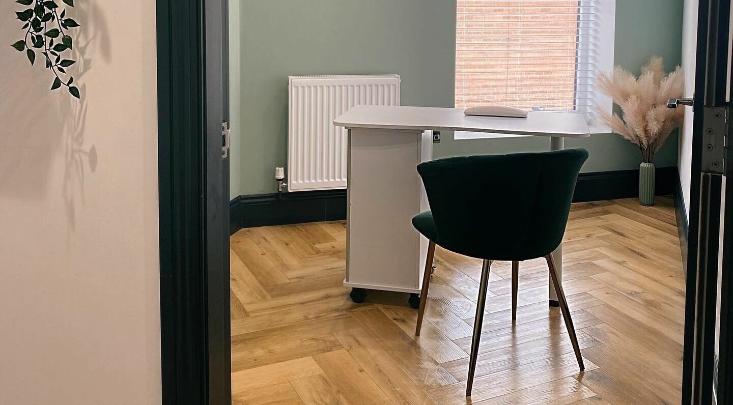 Serene office space at Leanne Alexandra in Bolton, England, GB with modern desk and chair.