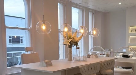Elegant interior of The Bella Lounge in Plymouth, England, GB, featuring stylish lighting and decor.