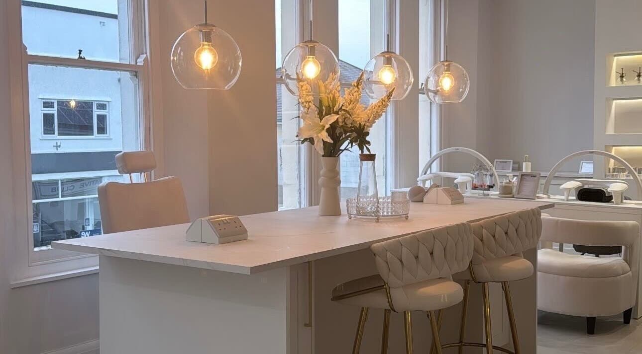Elegant beauty space at The Bella Lounge, Plymouth, England with chic decor and soft lighting.
