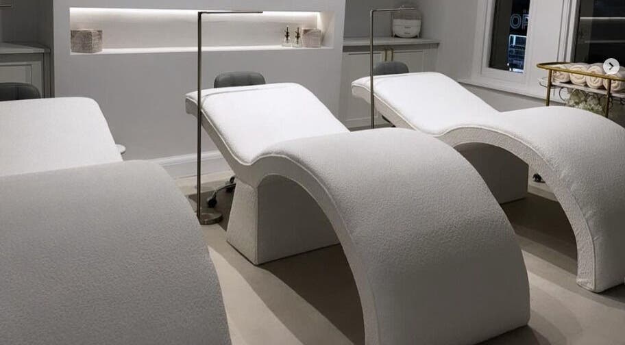 Modern treatment beds at The Bella Lounge, Plymouth, England, GB, invite relaxation in a serene ambiance.