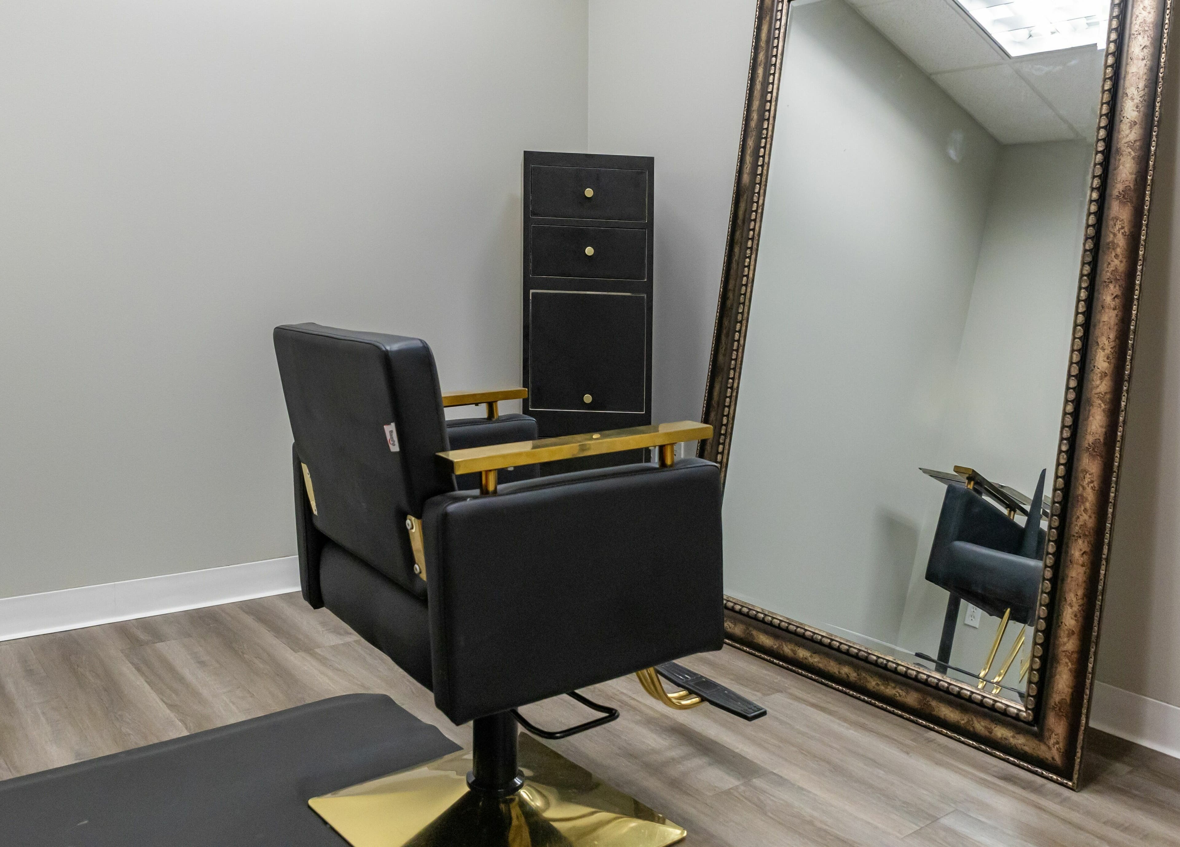 Luxurious salon chair and mirror at So Luxe Salon, Rancho Cucamonga, California, US.