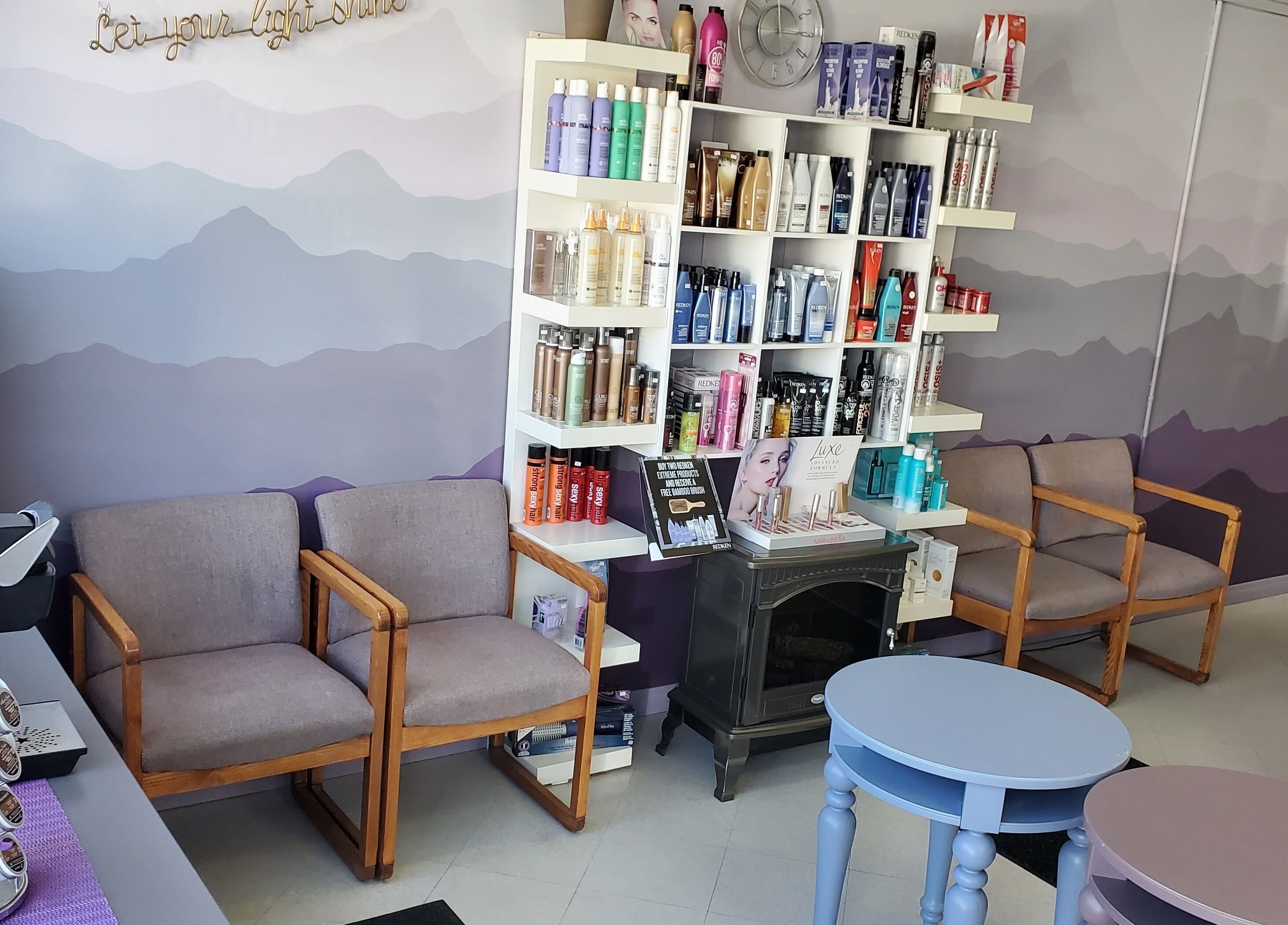 Cozy waiting area with products at Stylz Salon & Spa in Strathmore, Alberta, CA.