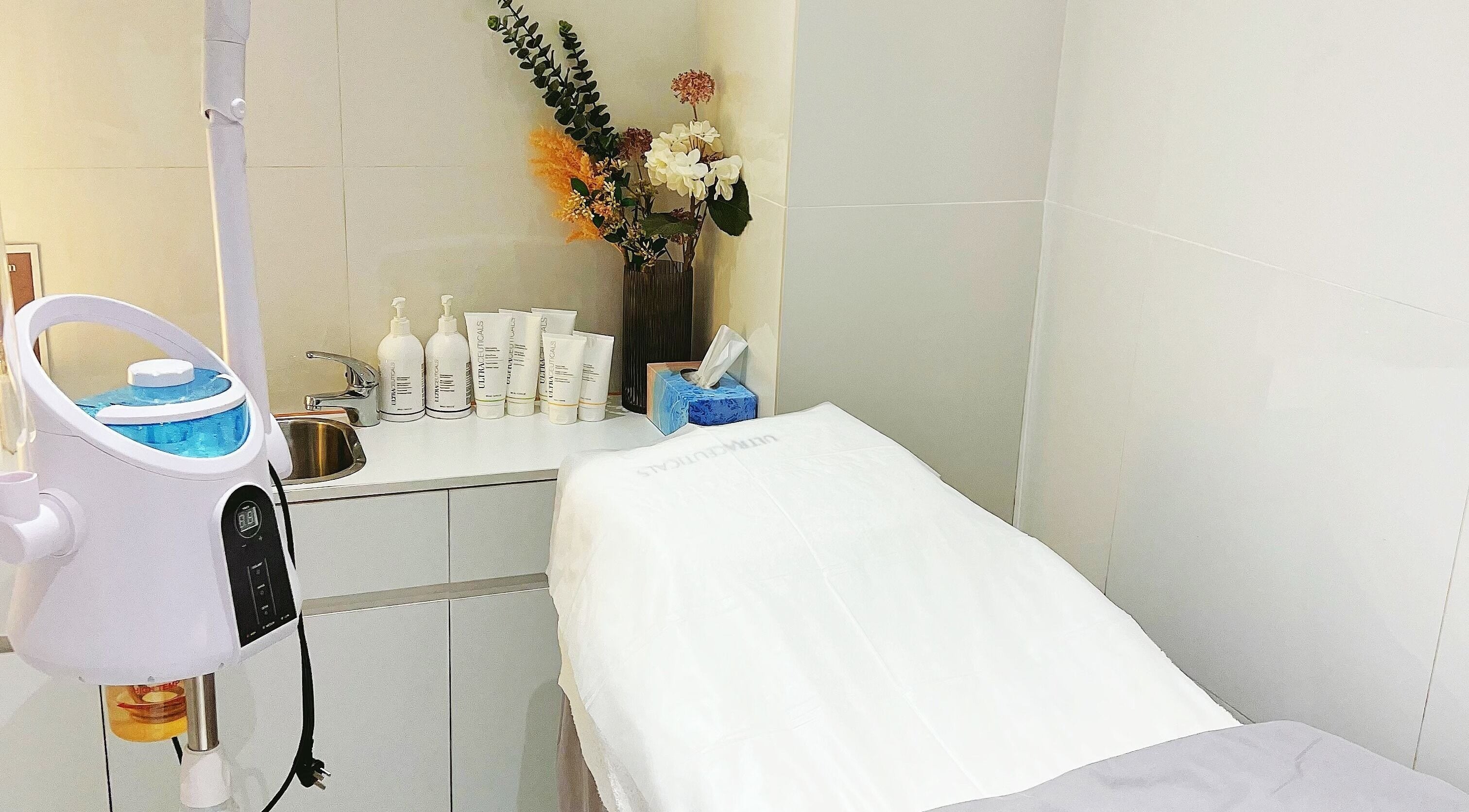 Tranquil beauty treatment room at GoodSkin+ Beauty, Brookvale, New South Wales, AU with skincare products.