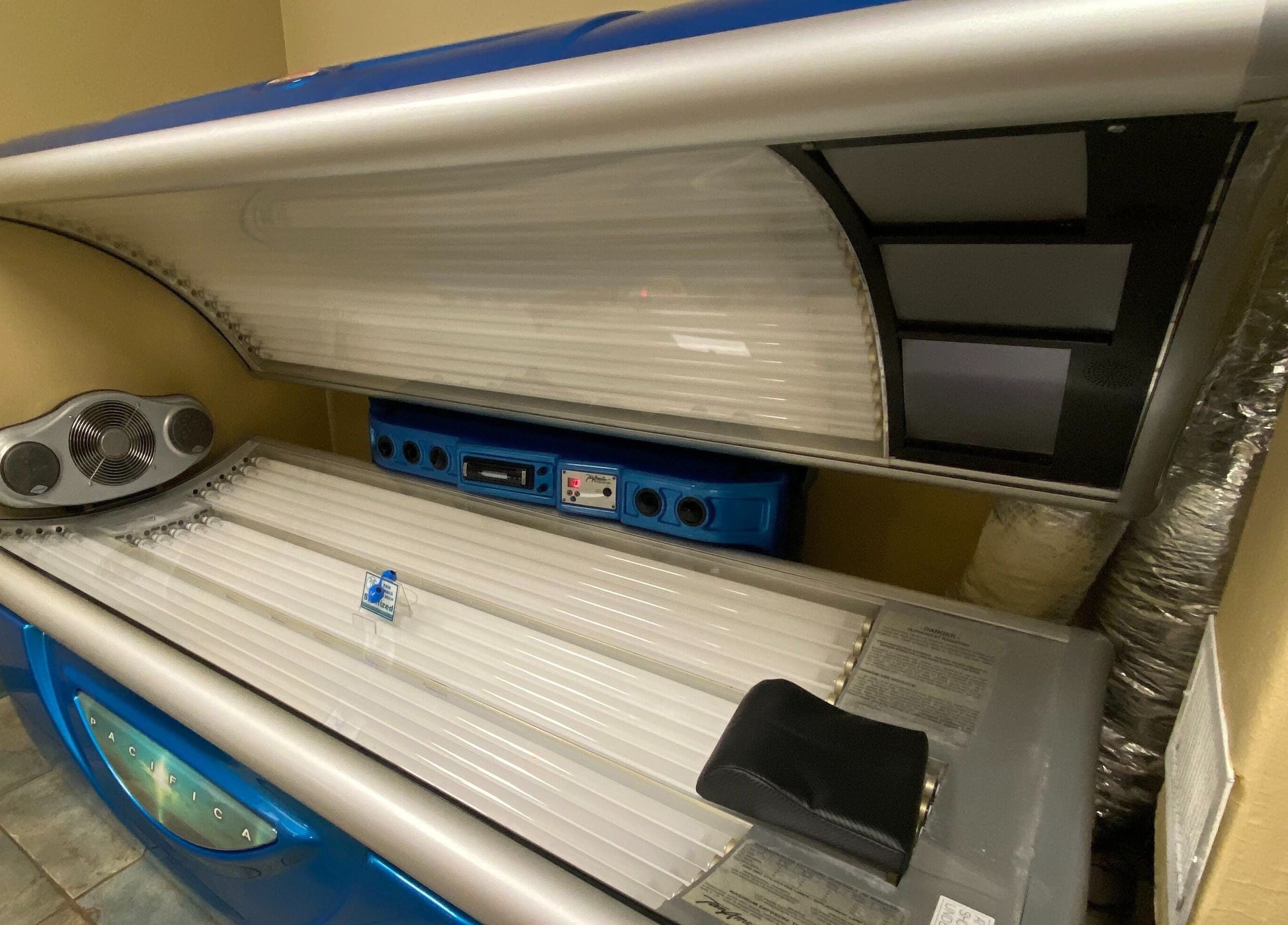 Luxurious tanning bed at Solar Image, Lufkin, Texas, US offers premium tanning experience.