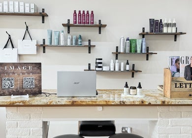 Stylish counter display at Image London - Tooting Moyser Road, with shelves of beauty products, London, England, GB.