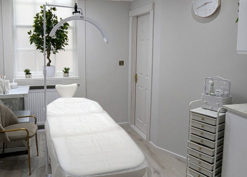 A tranquil treatment room at Oxygen Beauty London, London, England, GB, featuring a bright, minimalist design.