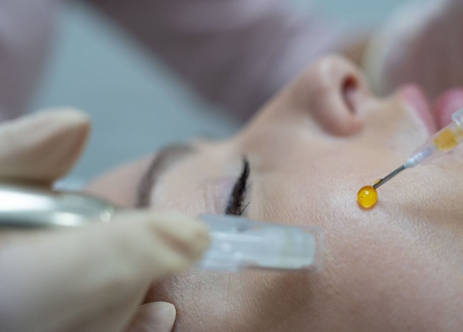 Facial treatment at Oxygen Beauty London, England, GB showcasing a close-up skincare procedure.