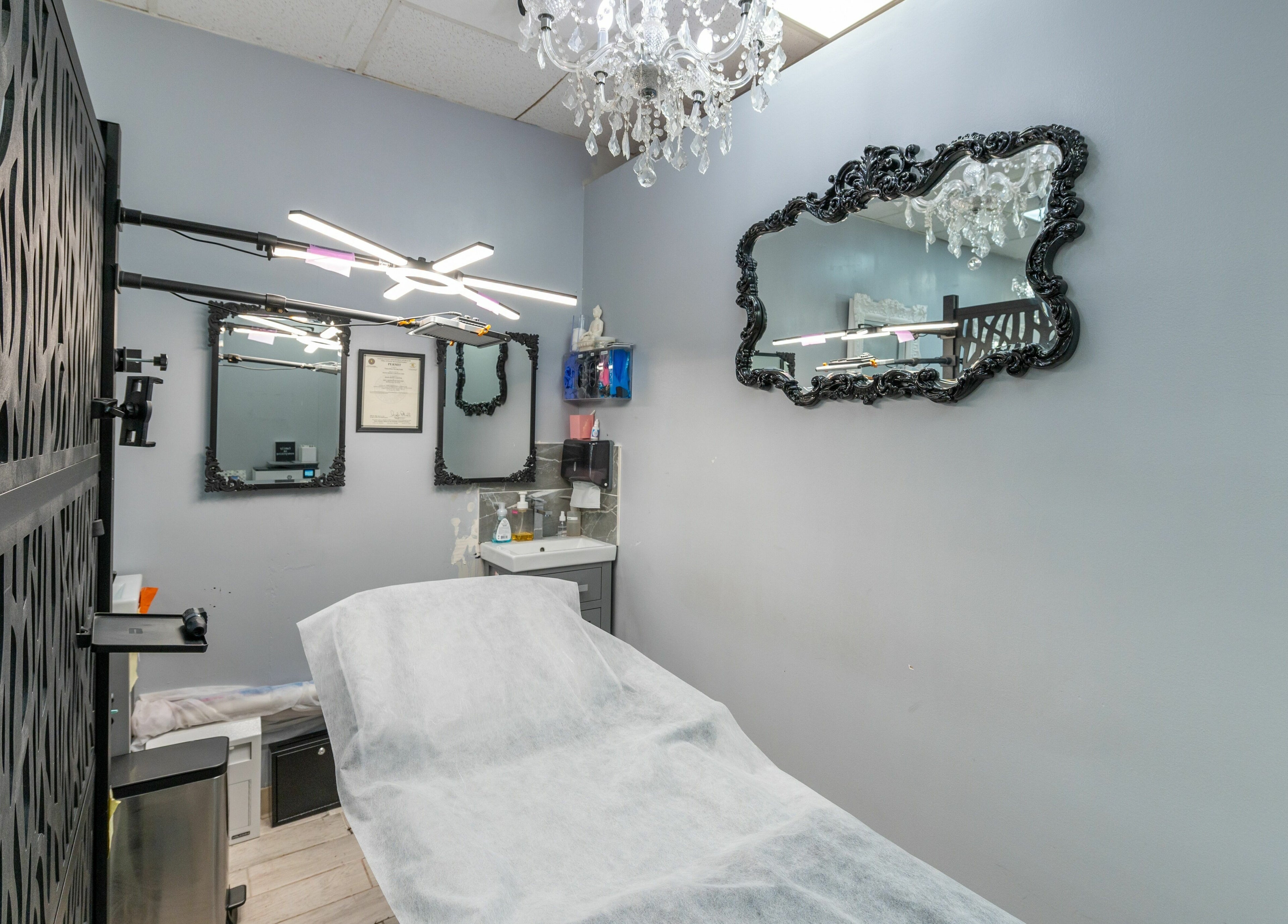 Elegant treatment room at Boom Brows Lash Bar in Bethpage, New York, US with luxurious decor and soft lighting.