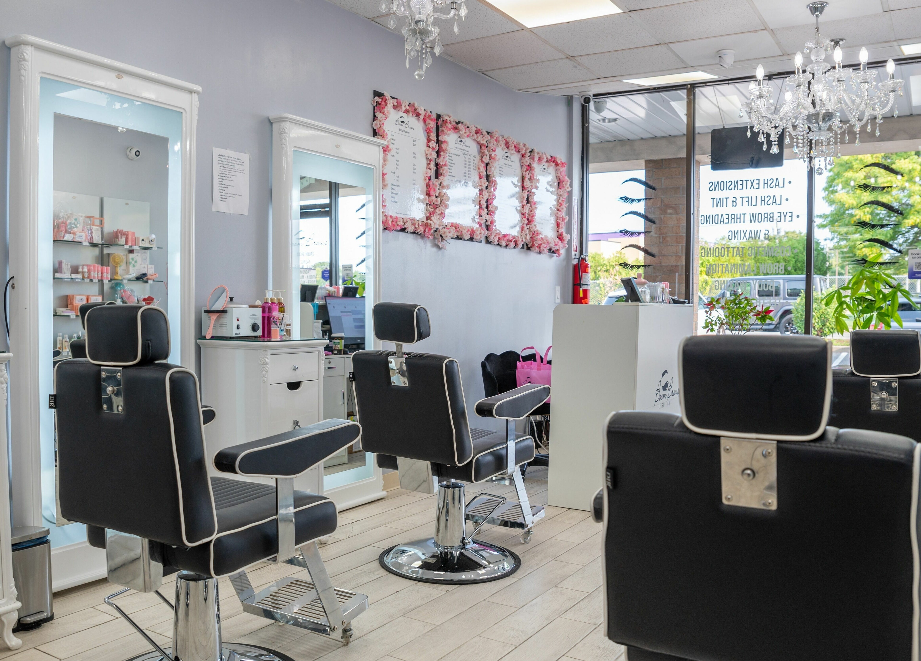 Boom Brows Lash Bar interior in Bethpage, New York, showcasing stylish beauty chairs and elegant decor.