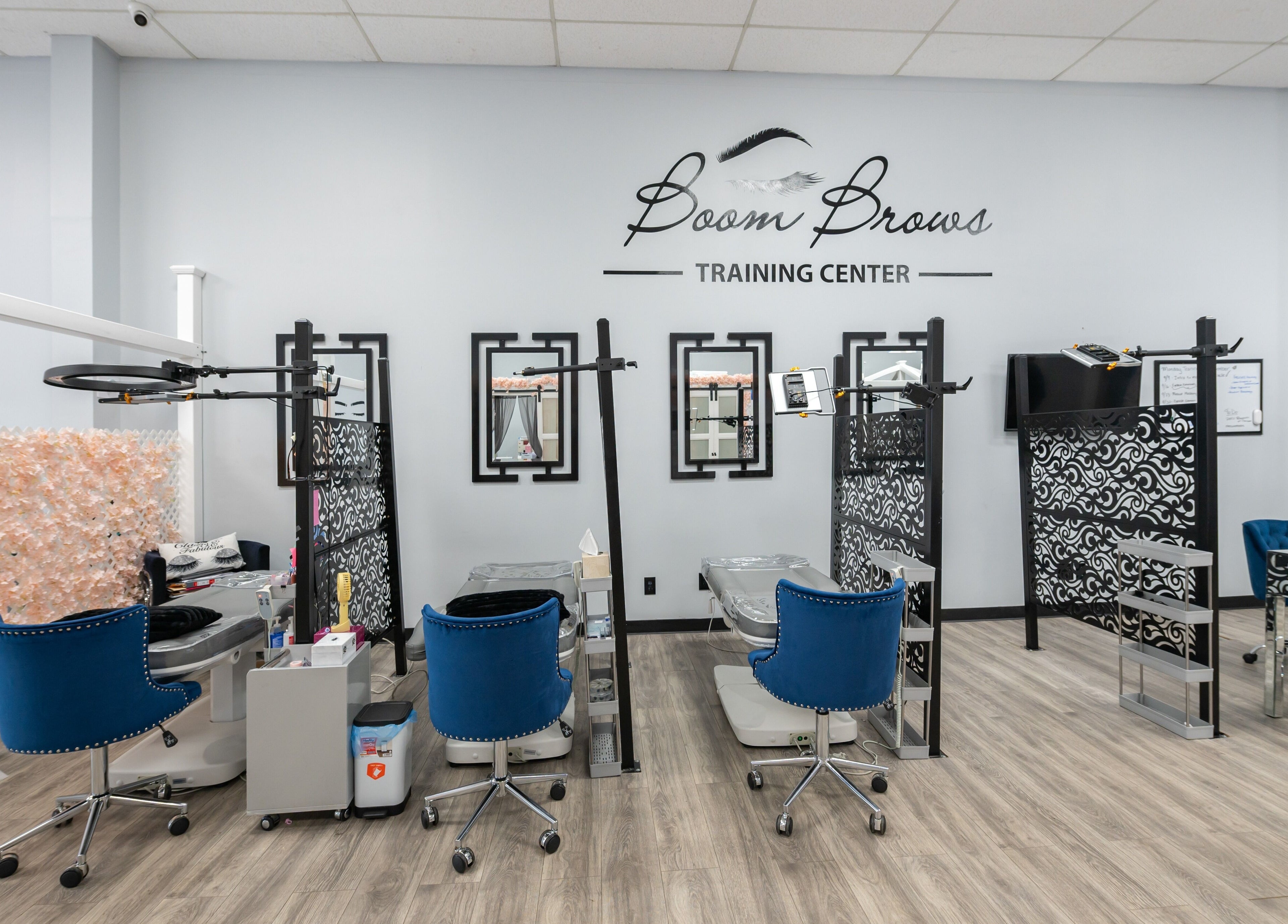 Chic interior of Boom Brows Lash Bar and More in Farmingdale, New York, US showcasing stylish service stations.