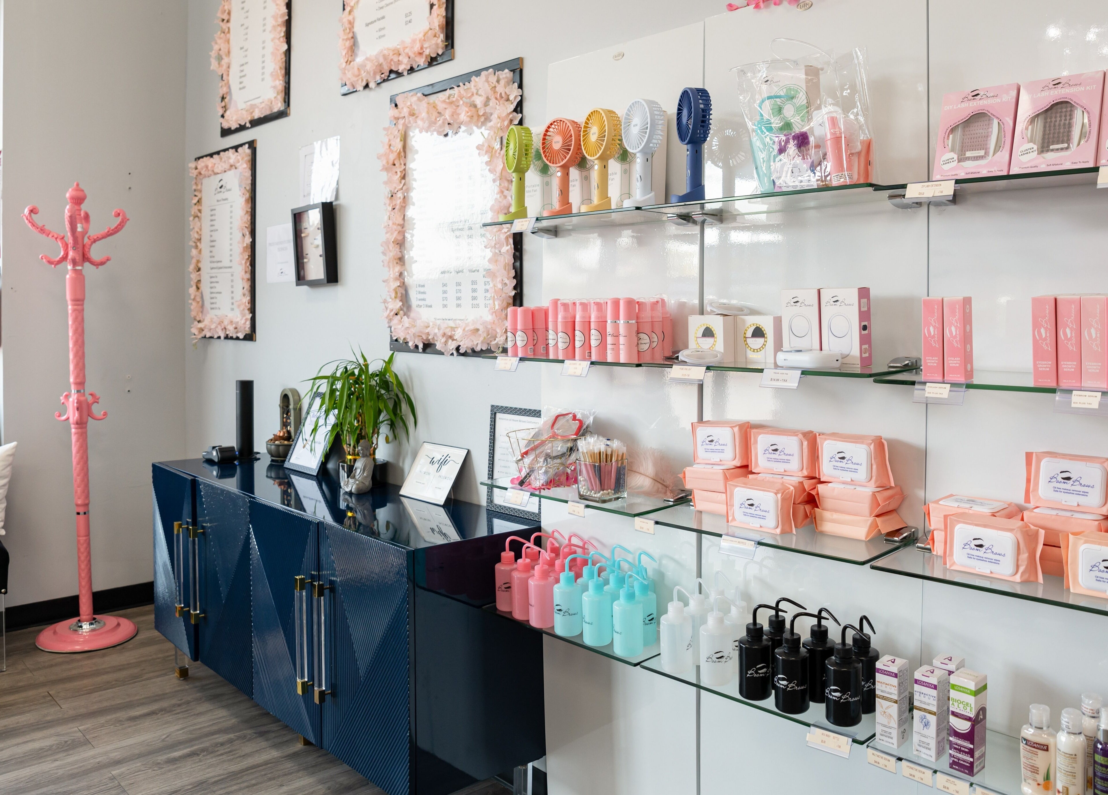 Elegant interior showcasing beauty products at Boom Brows Lash Bar and More, Farmingdale, New York, US.
