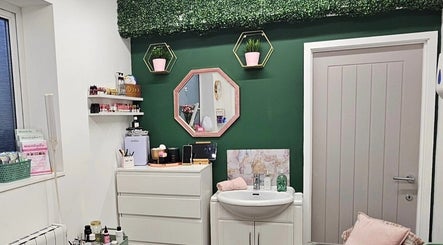 Elegant interior of Be Beau With Grace, Rochdale, England, GB with plants, mirror, and cosmetics.