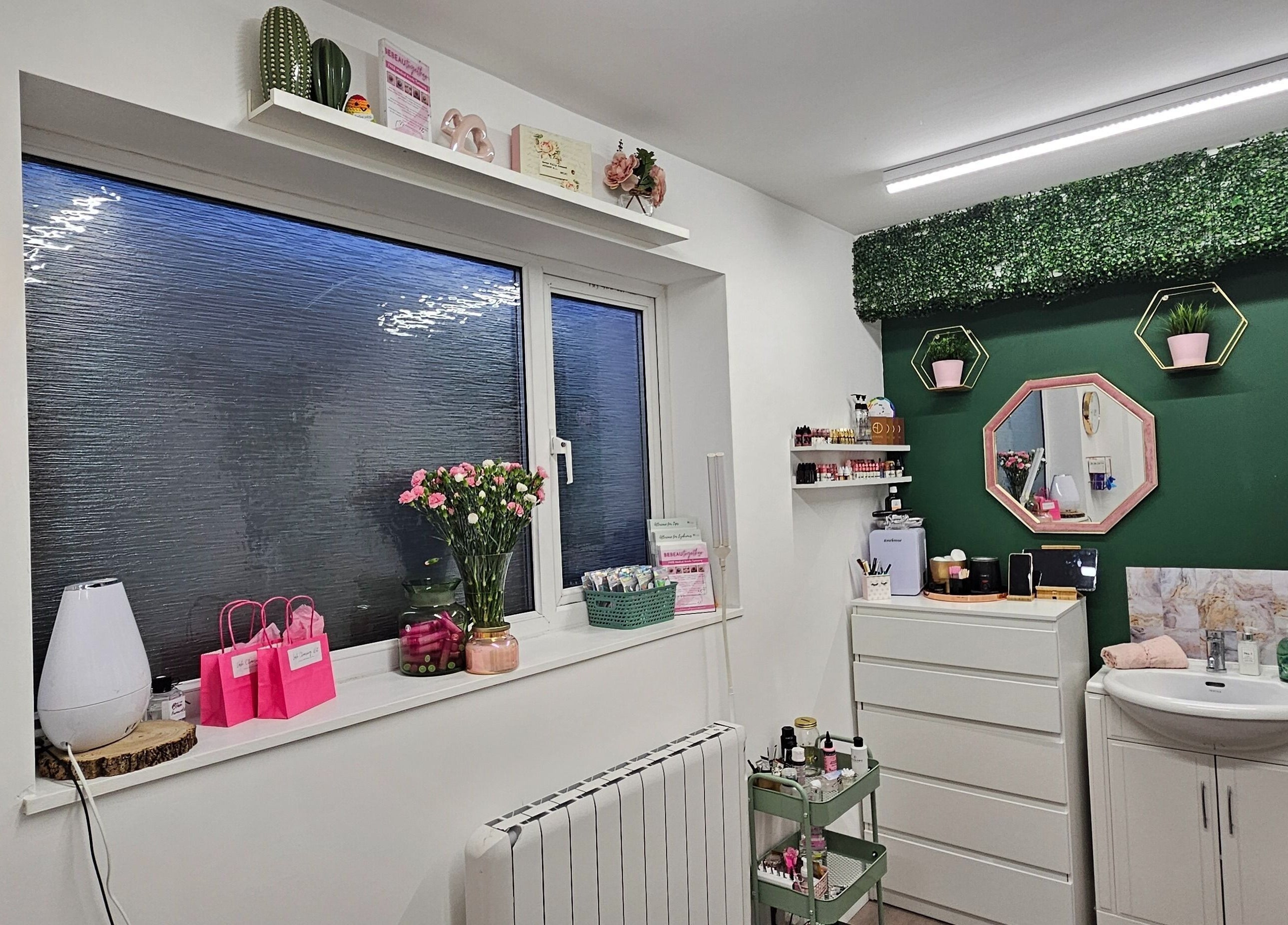 Be Beau With Grace venue in Rochdale, England, GB. Features stylish decor with green accents and modern furnishings.