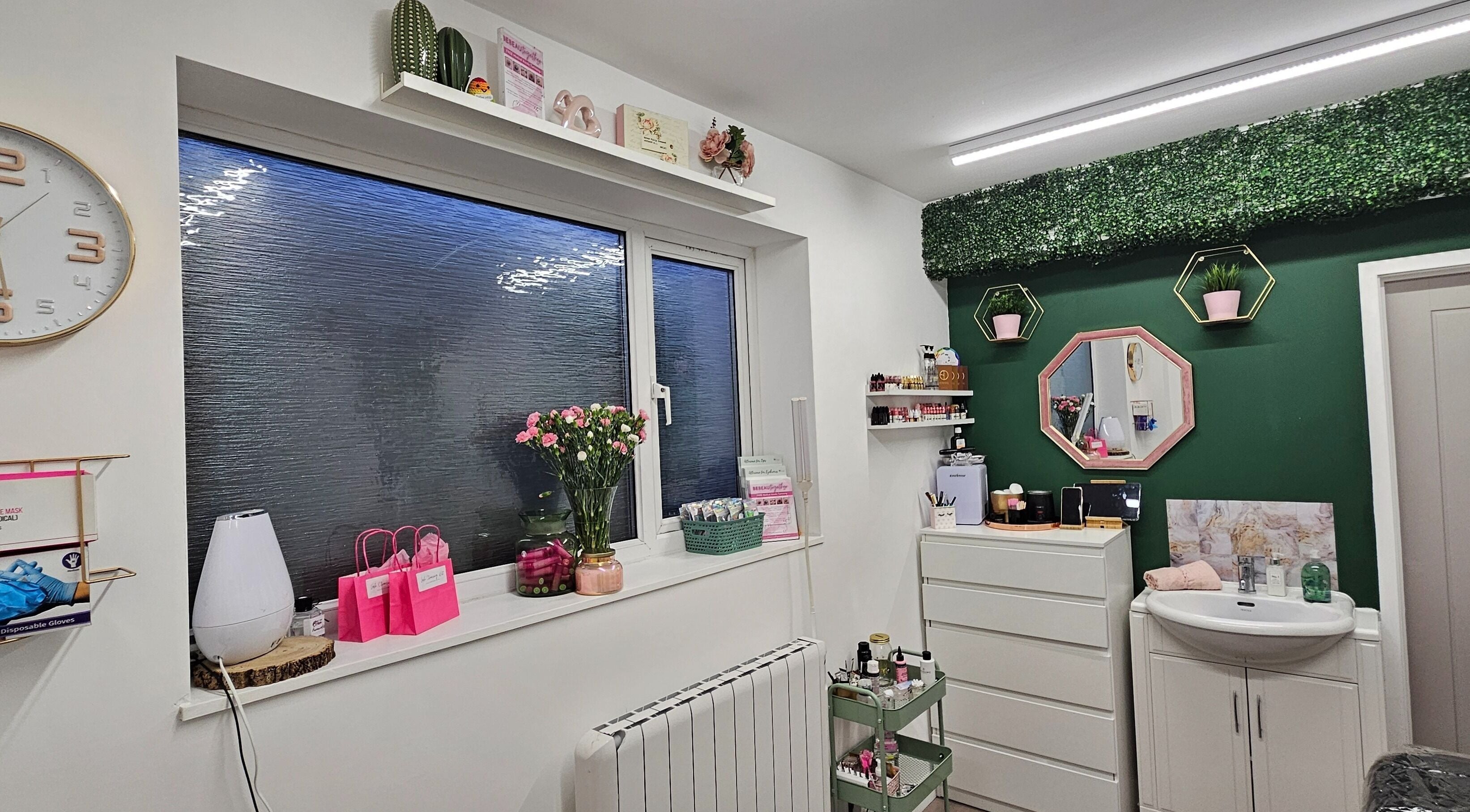 Be Beau With Grace venue in Rochdale, England, GB. Features stylish decor with green accents and modern furnishings.